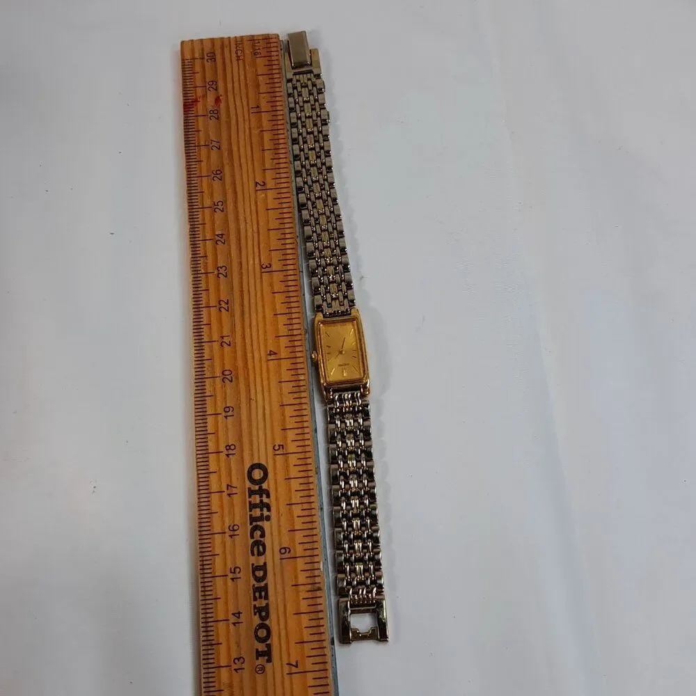 Vintage Seiko Watch Women Gold Tone Gold Dial Rectangle bracelet 2E20-7023 dress